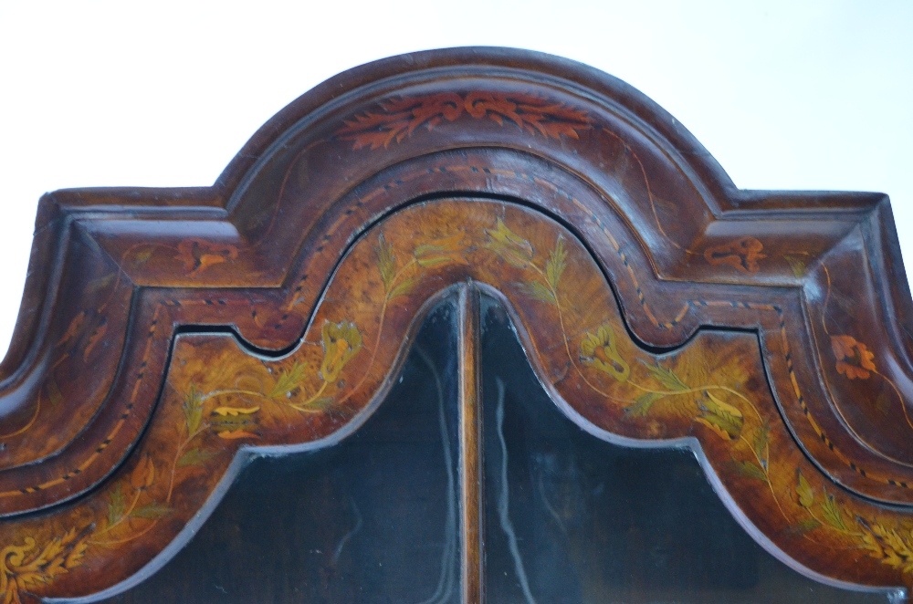 A 19th century Dutch floral marquetry walnut hanging display cabinet with moulded arched top over - Image 4 of 7