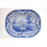 The Coysh Collection - A 19th century blue transfer printed meat plate decorated with a panoramic