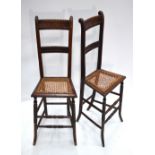 A pair of Victorian beech framed correction chars with caned seats (2)