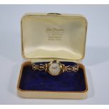 A lady's 9ct gold Limit wristwatch with 17-jewel Incabloc movement, on fancy-link bracelet strap,