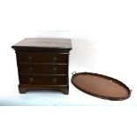 An early 19th century oak cellarette, hinged lid with divided interior,
