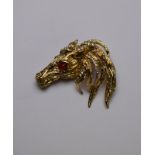 Christian Dior - A gilt metal horse head statement brooch,