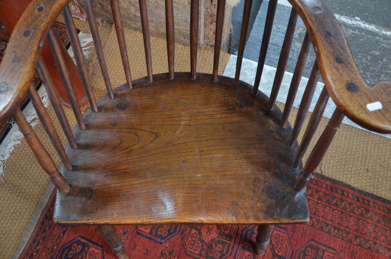 A 19th century elm seat comb back chair with flat arms, - Image 3 of 6