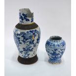 An 18th century Delft blue and white vase of lobed form with chinoiserie floral painted decoration,