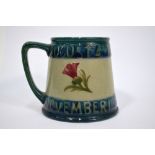 A Moorcroft commemorative 1919 Peace mug, designed by Lazenby Liberty for Liberty & Co,