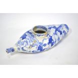 The Coysh Collection - A 19th blue transfer printed baby's feeding bottle decorated with a floral