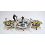 A heavy quality silver three-piece tea service of compressed globular form with shaped rims and