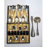 Masonic interest: an oak-cased set of six silver coffee spoons ,