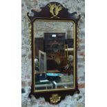 A George III mahogany fret-cut wall mirror,