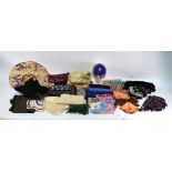 An assortment of silk, wool, velvet and other scarves,