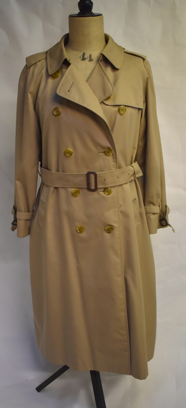 A lady's Burberrys' traditional raincoat with polished horn effect buttons,