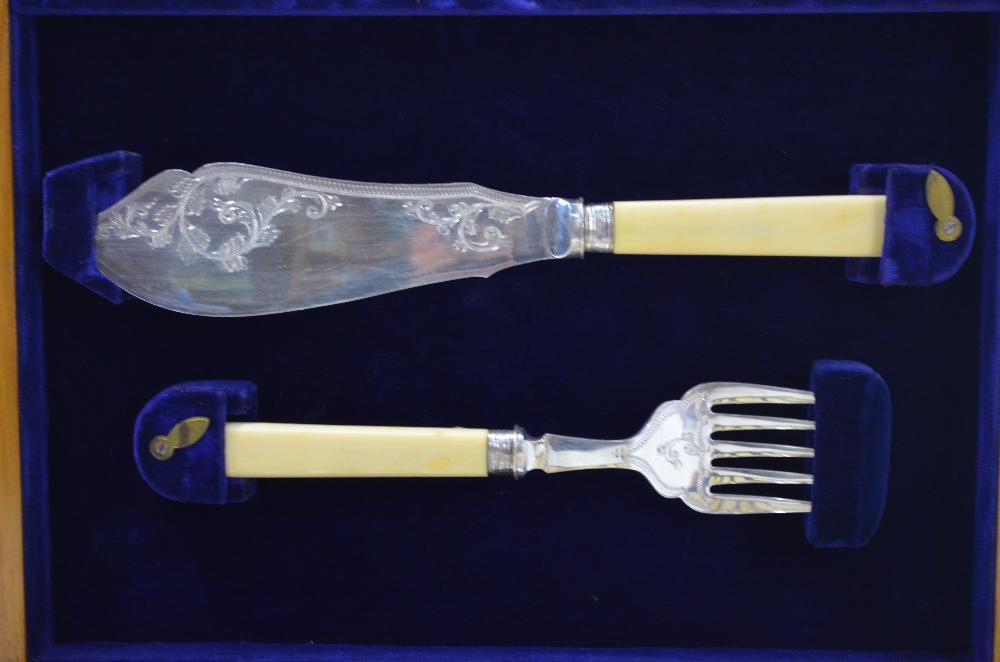 An oak-cased set of twelve Victorian engraved electroplated dessert knives and forks with carved - Image 7 of 8