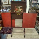 A Victorian mahogany triple panel rise and fall fire screen
