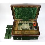 An early Victorian rosewood work-box, the green-silk lined interior with lift-out fitted tray,