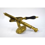 An antique brass bar-top corkscrew 'The Merritt',