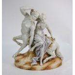 A German Altenburgh earthenware group, centaur with young woman, on marbled base,