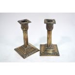 A pair of late Victorian loaded silver short candlesticks with palmate sconces and cluster columns,