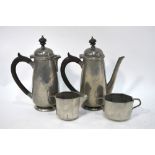 A Liberty & Co Tudric hammered pewter cafe au lait pair no.
