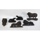 A pair of Victorian cast iron lion doorstops, 14 x 22 cm, to/w a similar sheep,