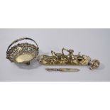 An Edwardian pierced silver bonbon basket with swing handle, Birmingham 1904,