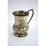 A late Victorian silver baluster Christening mug with embossed decoration, Edward Samuel Jones,