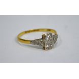 A diamond set rectangular cluster ring,