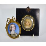 A Victorian oval portrait miniature on ivory of a lady, in ornate gilt metal frame,