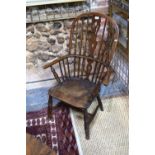 A 19th century elm seat Windsor armchair with spindle and fret cut splat a/f Condition