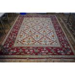 An old Turkmen carpet circa 1940's, the traditional design of geometric guls in three rows,