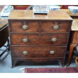 A George III mahogany chest of two short over two long graduated drawers,
