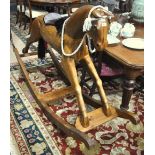 A large handmade traditional wooden rocking horse by Alan Evill,