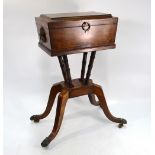 A Regency ebony inlaid mahogany teapoy,