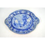 The Coysh Collection - A 19th century transfer printed tureen stand decorated with a view of a