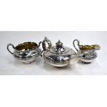 A William IV/Victorian silver matched three-piece bachelor tea service of compressed melon form,