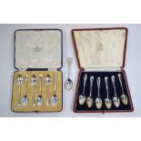 Eleven various silver rat-tail coffee spoons in two cases,