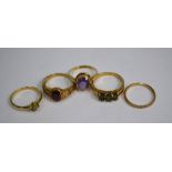 Four various stone set rings including oval amethyst set 9ct shank, 9ct yellow gold wedding band,