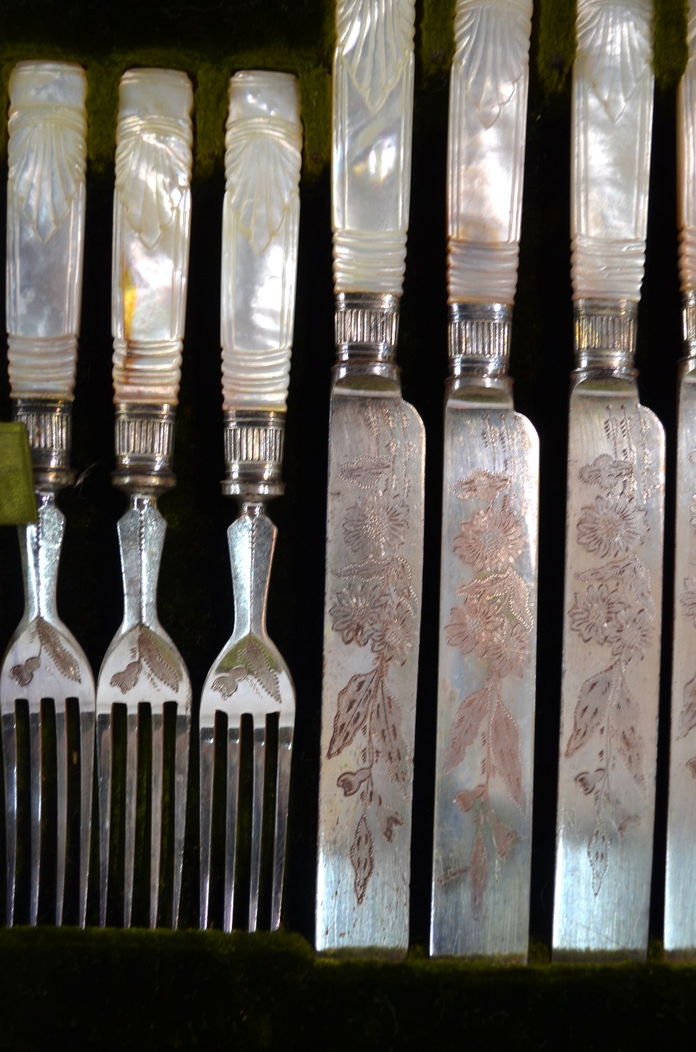 An oak-cased set of twelve Victorian engraved electroplated dessert knives and forks with carved - Image 3 of 8