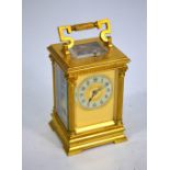 A French gilt brass quarter-repeating carriage clock, the two cylinder movement numbered 3620,