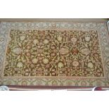 A handmade Persian Heriz design small carpet,