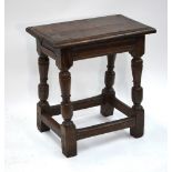 A 17th century oak joint stool,