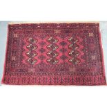 An old Afghan Turkmen design kelim backed woven saddlebag, red ground,