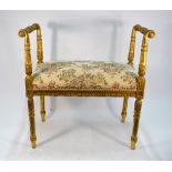 A giltwood framed stool with overstuffed seat