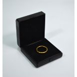 A 22ct yellow gold court style wedding band, approx 5g,