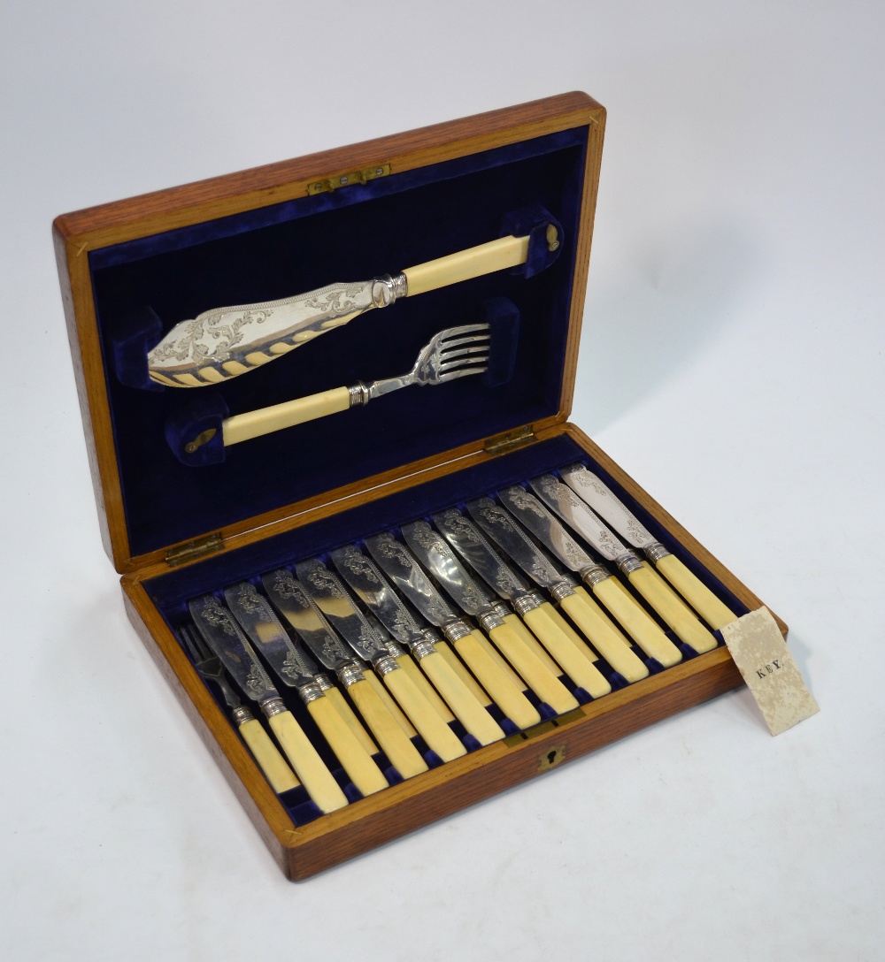 An oak-cased set of twelve Victorian engraved electroplated dessert knives and forks with carved - Image 5 of 8