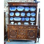 A George III mahogany and oak high dresser,