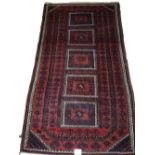 An antique Persian Baluch rug, circa 190
