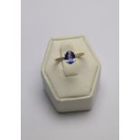 An oval tanzanite ring, 18ct yellow gold