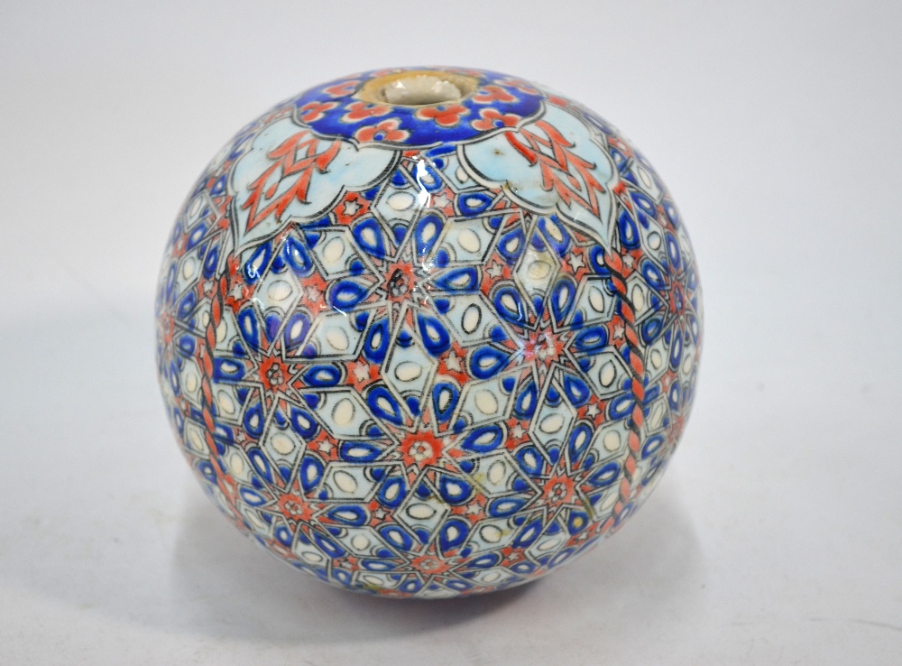 An Ottoman style, ceramic light or other hanging object of spherical form,