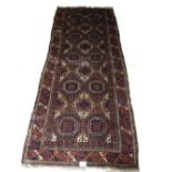 An antique Kurd Baluch rug, circa 1900,