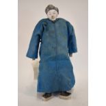 An interesting Chinese doll of a standing scholar or high ranking official;